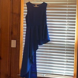 Blue asymmetrical peplum top